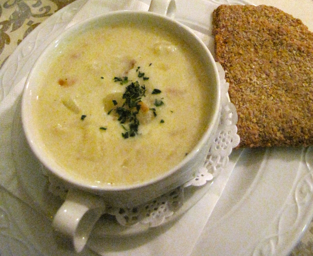 Cup of Cullen Skink seafood chowder with an oatcake