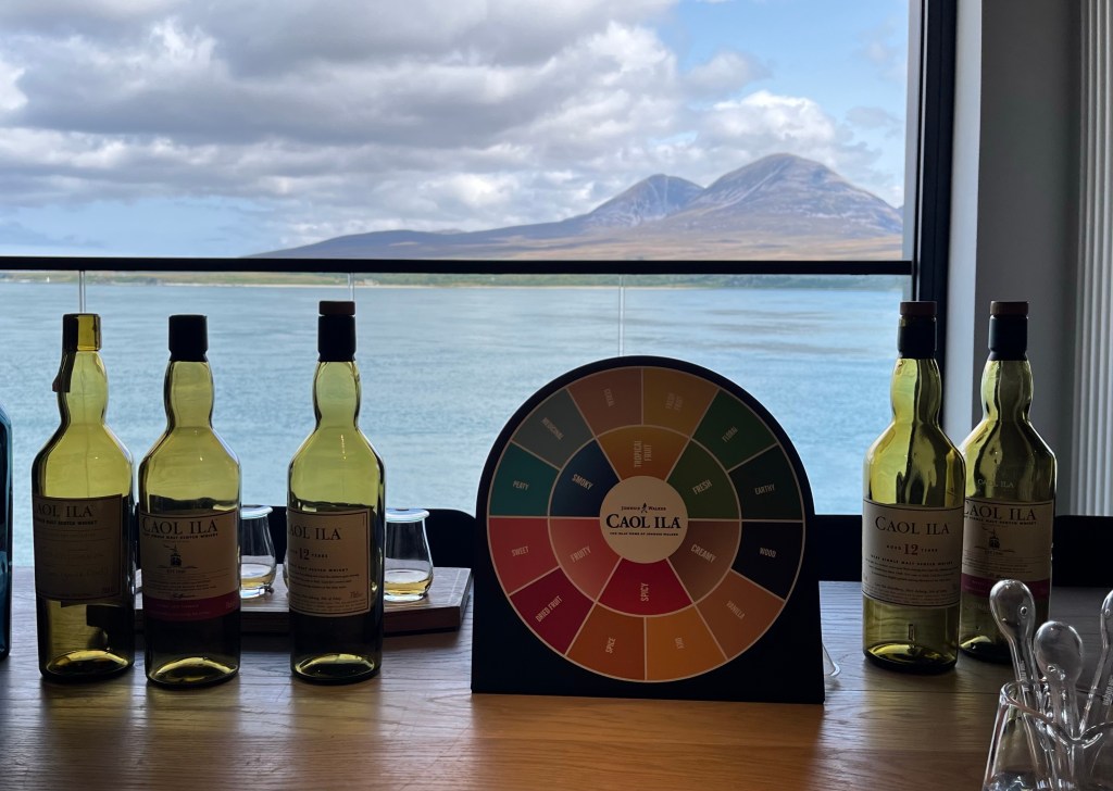 Jura from Caol Ila tasting room, whisky bottles and chart